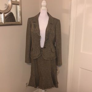 Never worn with tags! 2 piece suit in brown with gold sparkle detail in size 10